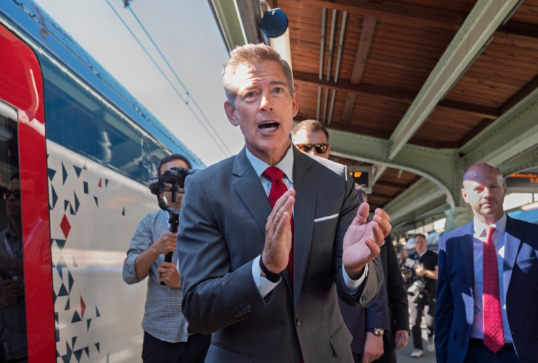 Sean Duffy boards a new train at Union Station.