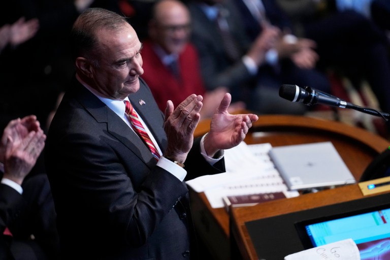 Missouri Gov. Mike Kehoe applauds while delivering the State of the State address, Jan. 28, 2025, in Jefferson City, Mo.