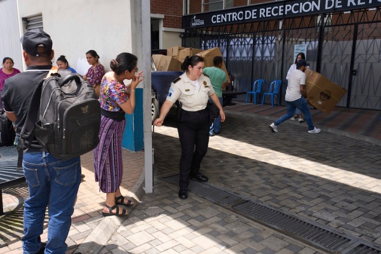 People wait for loved ones from Guatemala deported from the United States outside La Aurora International Airport, in Guatemala City, Sunday, Aug. 31, 2025.