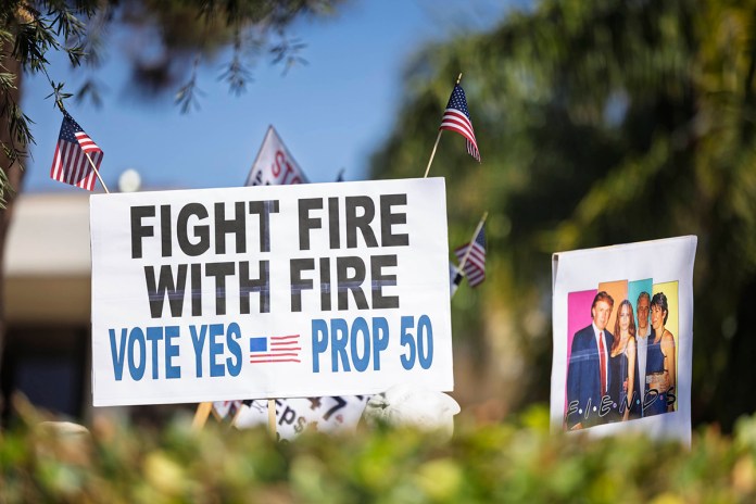 Indivisible Santa Barbara continues It's protest against the Trump administration as demonstrators line upper State Street in Santa Barbara, CA on August 30, 2025. (Photo by Rod Rolle/Sipa USA)(Sipa via AP Images)