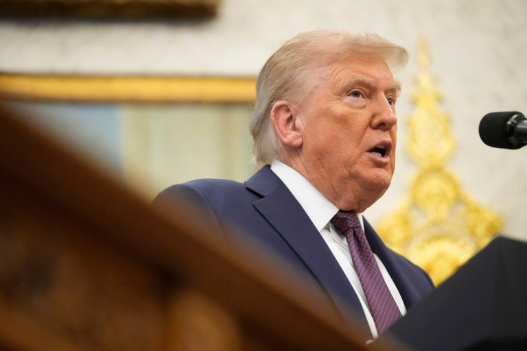 Trump speaks during Oval Office announcement.