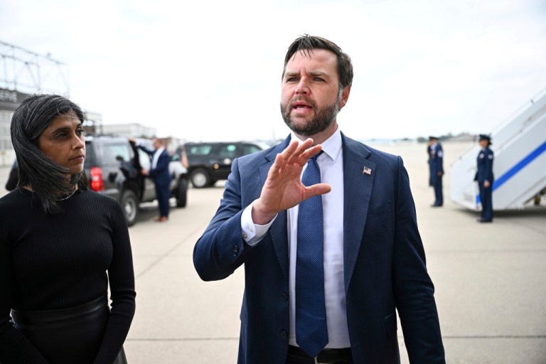 U.S. Vice President JD Vance speaks to the press as second lady Usha Vance looks on the tarmac of Minneapolis' Saint Paul International Airport, Wednesday, Sept. 3, 2025, St. Paul, Minn, after paying their respects to victims of the Annunciation Catholic Church shooting.