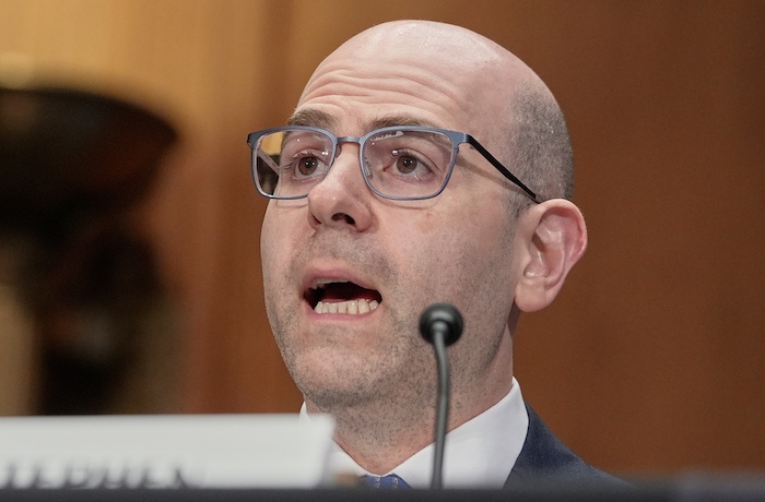 Stephen Miran testifies during a Senate Banking Committee hearing on his nomination to be a member of the Board of Governors of the Federal Reserve System, on Capitol Hill Thursday