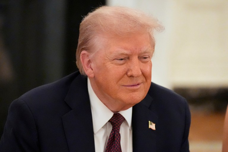 President Donald Trump speaks at a dinner in the State Dinning Room of the White House.