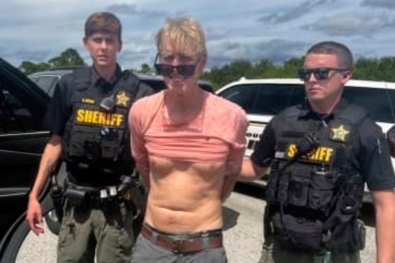 FILE - In this imaged released by the Martin County, Fla., Sheriffís Office, law enforcement officers arrest Ryan Routh, the man suspected in the apparent assassination attempt of Donald Trump, Sept. 15, 2024. (Martin County Sheriffís Office via AP)