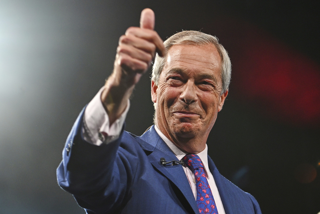 Britain's Reform UK party leader Nigel Farage reacts during the party's annual conference.