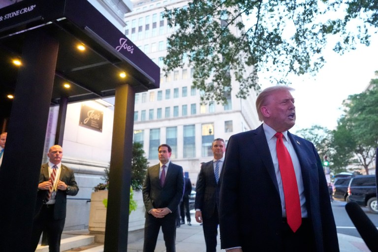 President Donald Trump speaks to reporters before he enters a restaurant near the White House, Tuesday, Sept. 9, 2025, in Washington, to have dinner with Secretary of State Marco Rubio, Defense Secretary Pete Hegseth and Vice President JD Vance.