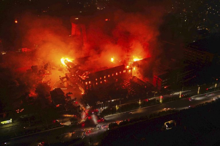Flames come out from the residence of Nepal President Ram Chandra Poudel after it was set on fire by protesters during a protest against social media ban and corruption in Kathmandu, Nepal, Tuesday, Sept. 9, 2025.