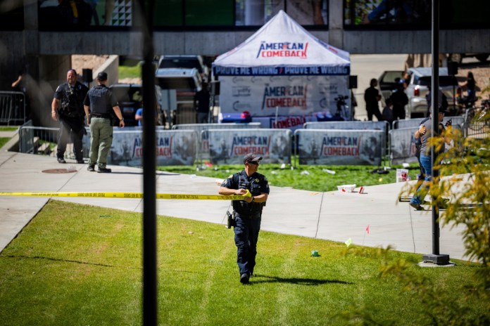 Law enforcement tapes off an area after Charlie Kirk, the CEO and co-founder of the conservative youth organization Turning Point USA, was shot at the Utah Valley University, Wednesday, Sept. 10, 2025, in Orem, Utah.
