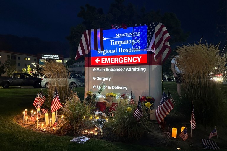 Flowers rest next to a sign for Timpanogos Regional Hospital after Charlie Kirk was shot and killed Wednesday, Sept. 10, 2025, in Orem, Utah.