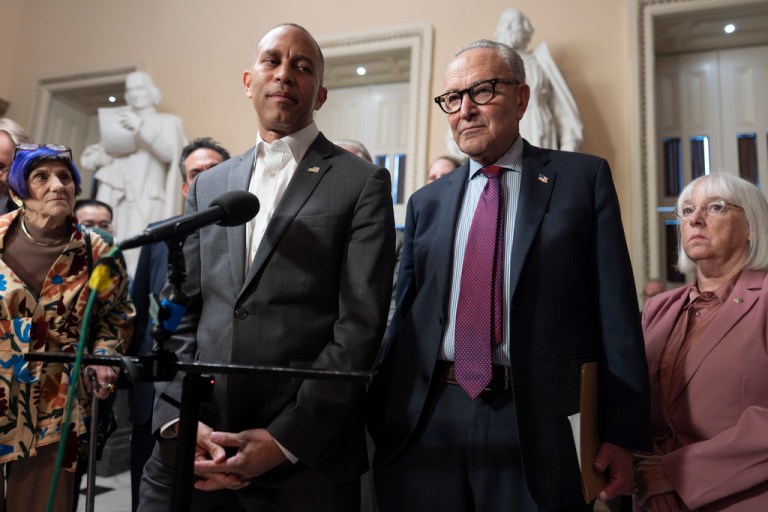House Democratic Leader Hakeem Jeffries, left, and Senate Democratic Leader Chuck Schumer, both of New York, tell reporters that they are united as the Sept. 30 funding deadline approaches, at the Capitol in Washington, Thursday, Sept. 11, 2025. (AP Photo/J. Scott Applewhite)