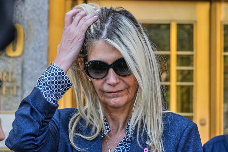 Nadine Menendez walks outside.