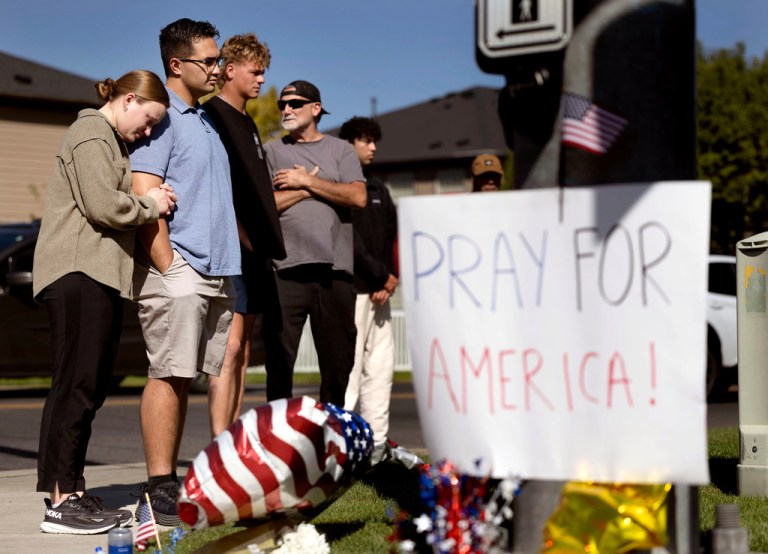 People visit a memorial honoring Charlie Kirk at Timpanogos Regional Hospital in Orem, Utah, on Thursday, Sept. 11, 2025.