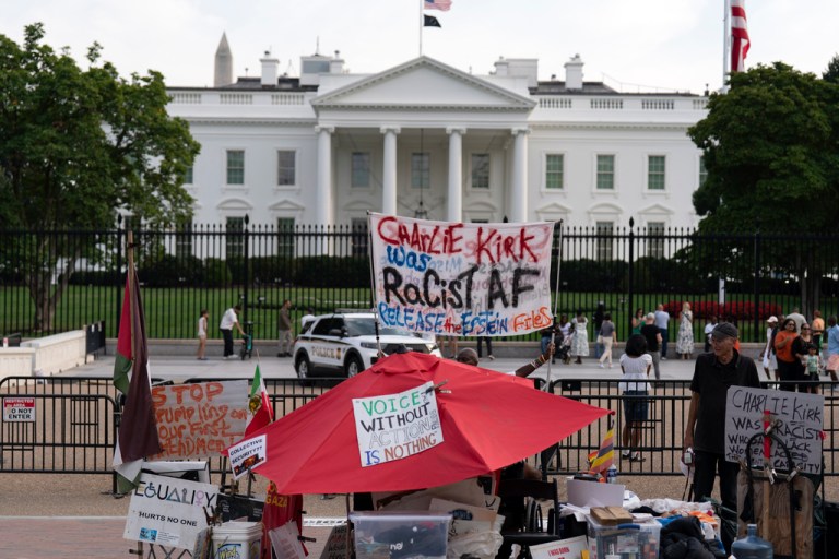 Demonstrators protest outside of the White House