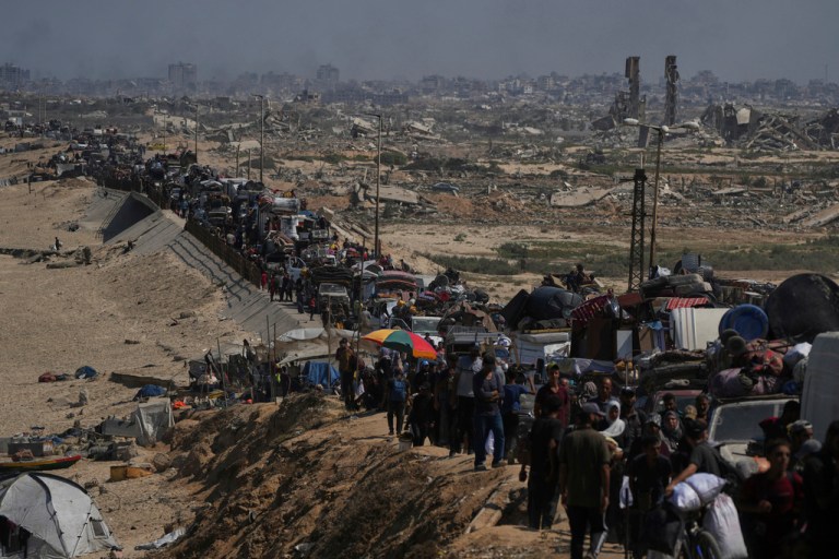 Displaced Palestinians flee northern Gaza along the coastal road toward the south, after Israel's military says its expanded operation in Gaza City has begun and warns residents to leave, Tuesday, Sept. 16, 2025.