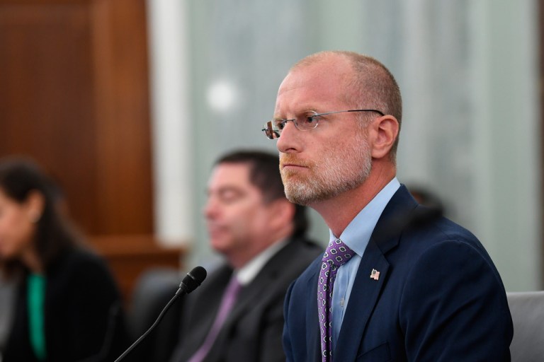 Federal Communications Commission Chairman Brendan Carr sits at a congressional hearing.
