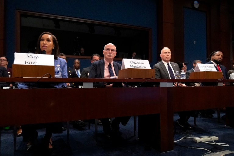 Washington, D.C., Mayor Muriel Bowser, Council of the District of Columbia Chairman Phil Mendelson, D.C. Attorney General Brian Schwalb, and Gregory Jackson Jr., former deputy director of the White House Office of Gun Violence Prevention, listen during a hearing.