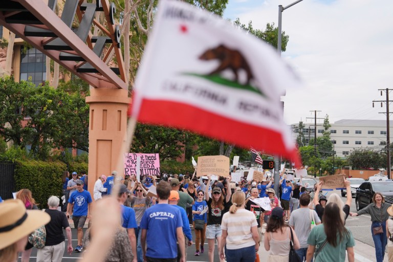 Demonstrators picket in response to the suspension of Jimmy Kimmel's late-night show.