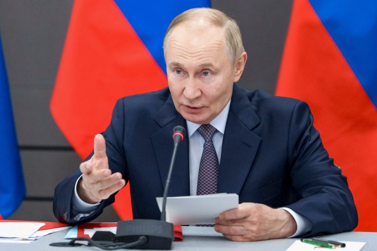 Russian President Vladimir Putin chairs a meeting of the Military-Industrial Commission.