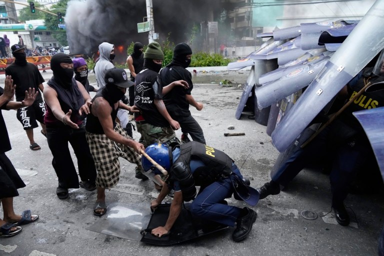 Protesters in the Philippines outside the palace