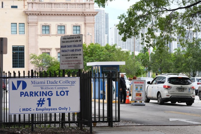 Republican Florida Gov. Ron DeSantis is proposing that President Donald Trump's presidential library be built in a parking lot that is currently used by Miami-Dade College staff and faculty and is adjacent to the Freedom Tower, Tuesday, Sept. 23, 2025, in Miami. 