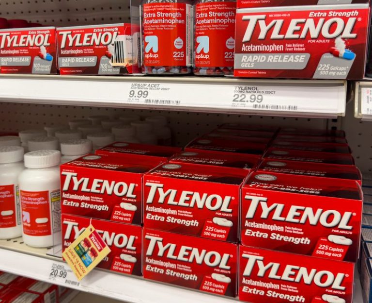 Tylenol pain relief products are shown on a store shelf.