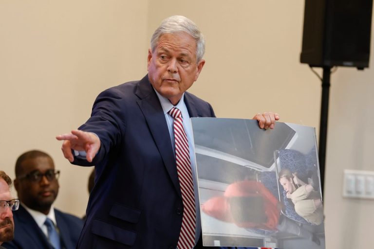 Rep. Ralph Norman (R-SC) holds a print showing the moment before Iryna Zarutska was murdered on a Charlotte light rail train at the House Judiciary Subcommittee on Oversight hearing on violent crime in Charlotte, N.C., Monday, Sept. 29, 2025. (AP Photo/Nell Redmond)