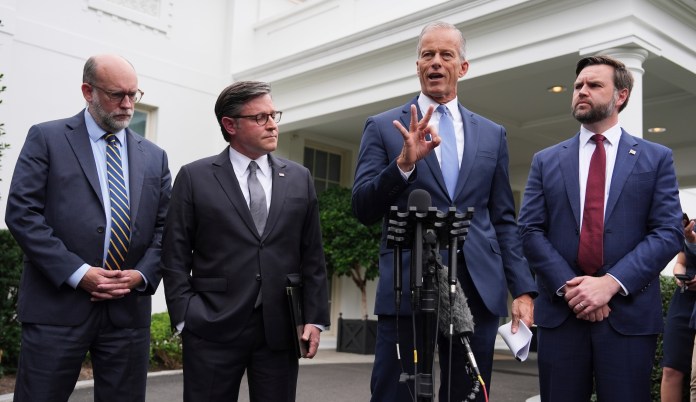 Senate Majority Leader John Thune, R-S.D., speaks alongside Russell Vought, Office of Management and Budget director, from left, House Speaker Mike Johnson, R-La., and Vice President JD Vance, as they address members of the media outside the West Wing at the White House in Washington, Monday, Sept. 29, 2025, in Washington.