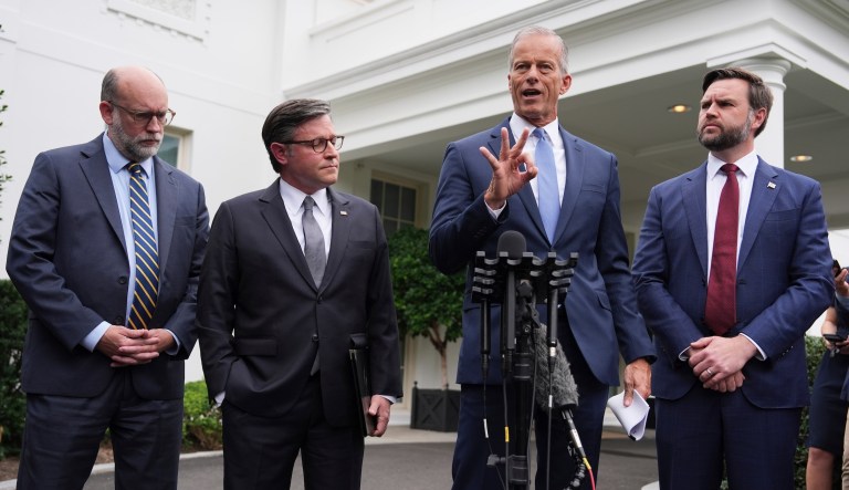 Senate Majority Leader John Thune, R-S.D., speaks alongside Russell Vought, Office of Management and Budget director, from left, House Speaker Mike Johnson, R-La., and Vice President JD Vance, as they address members of the media outside the West Wing at the White House in Washington, Monday, Sept. 29, 2025, in Washington.