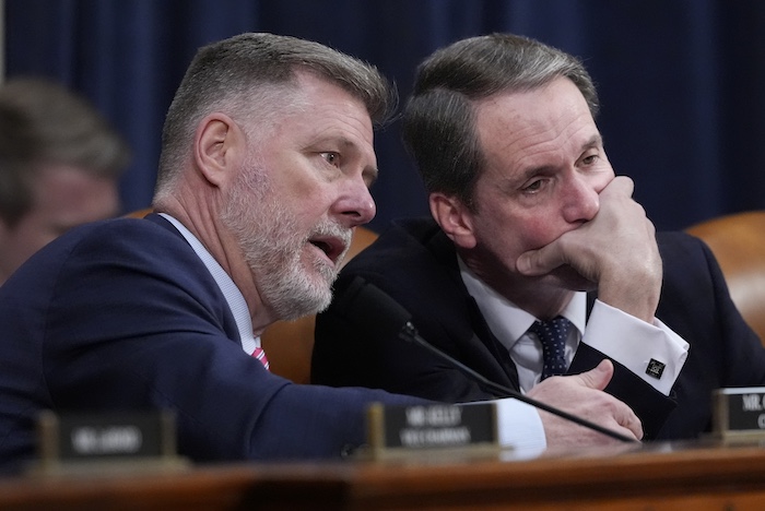 House Intelligence Committee Chairman Rick Crawford (R-AR) confers with ranking member Jim Himes (D-CT).