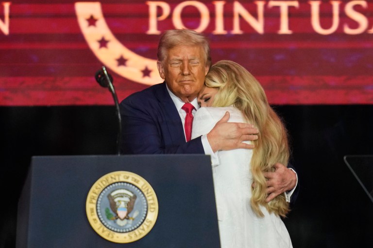President Donald Trump embraces Erika Kirk at a memorial for conservative activist Charlie Kirk, Sunday, Sept. 21, 2025, at State Farm Stadium in Glendale, Ariz. (AP Photo/John Locher)