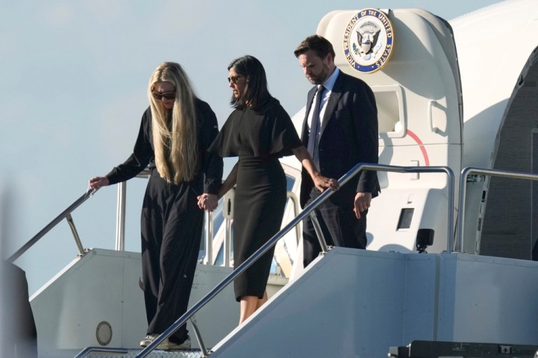 Vice President JD Vance, right, Second Lady Usha Vance, center, and Erika Kirk deplane Air Force Two, carrying the body of Charlie Kirk, the CEO and co-founder of Turning Point USA who was shot and killed, Thursday, Sept. 11, 2025, in Phoenix.