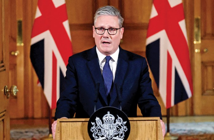 United Kingdom Prime Minister Keir Starmer speaks following an emergency cabinet meeting on Gaza in London, July 29, 2025. Starmer announced that the U.K. would recognize Palestine as a state on Sept. 21, 2025. (Toby Melville/AFP/Getty)