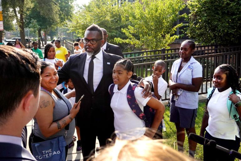 Mayor Brandon Johnson greets students, parents, and staff during the first day of classes at Beidler Elementary School on August 21, 2023 in Chicago, Illinois. Chicago Public Schools has been forced to find alternative ways to get its students to schools as the district faces a severe shortage of school bus drivers. School districts around the country are facing similar shortages (Photo by Scott Olson/Getty Images)