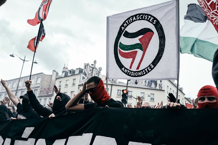 A few hundred people march through the streets of Paris, France, on June 8, 2025, to pay tribute to Clement Meric, the young anti-fascist activist murdered 12 years ago by a far-right skinhead. The demonstration is called by the 'Action Antifasciste -Paris - Banlieue', the 'Comite pour Clement', and 'Solidaires', and also denounces the war in Gaza and the rise in racist acts. (Photo by Jerome Gilles/NurPhoto via Getty Images)