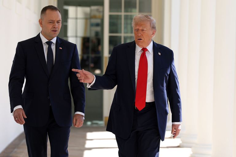President Donald Trump walks with Polish President Karol Nawrocki down the Colonnade to the Oval Office at the White House on September 3, 2025 in Washington, DC. President Nawrocki is visiting Washington to meet with President Trump for a bilateral meeting to discuss the war in Ukraine. (Photo by Alex Wong/Getty Images)