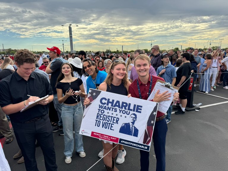 Volunteers sign up new voters at Charlie Kirk's memorial (Courtesy: Turning Point Action)