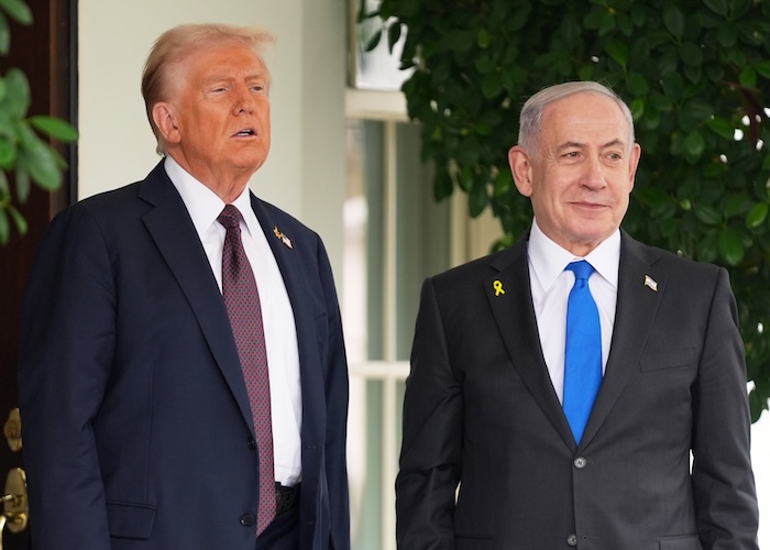 President Donald Trump greets Israeli Prime Minister Benjamin Netanyahu.