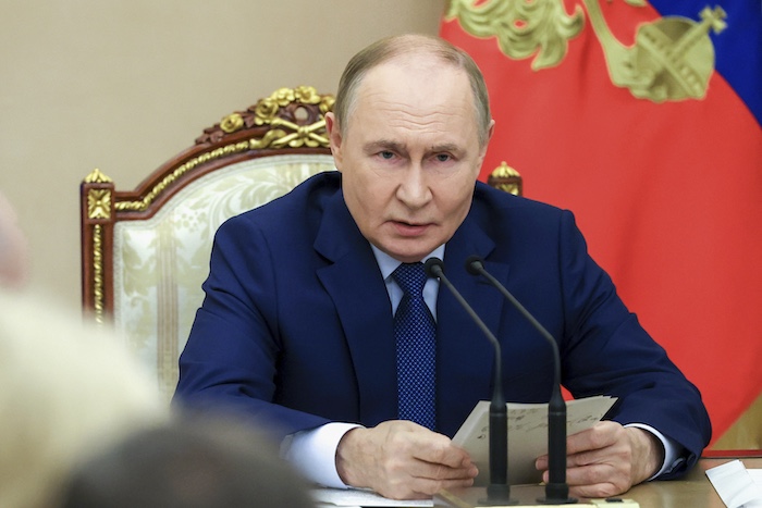 Russian President Vladimir Putin speaks at a meeting