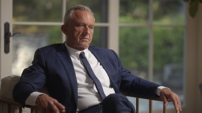Robert F. Kennedy Jr. speaks with Oliver Stone in the film RFK: Legacy released by Angel Studios. (Angel Studios)
