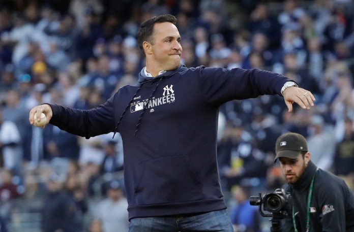 Former New York Yankees first baseman Mark Teixeira throws out the first pitch before Game 2 of an American League Division Series baseball game between the New York Yankees and the Minnesota Twins, Saturday, Oct. 5, 2019, in New York. (Frank Franklin II/AP)