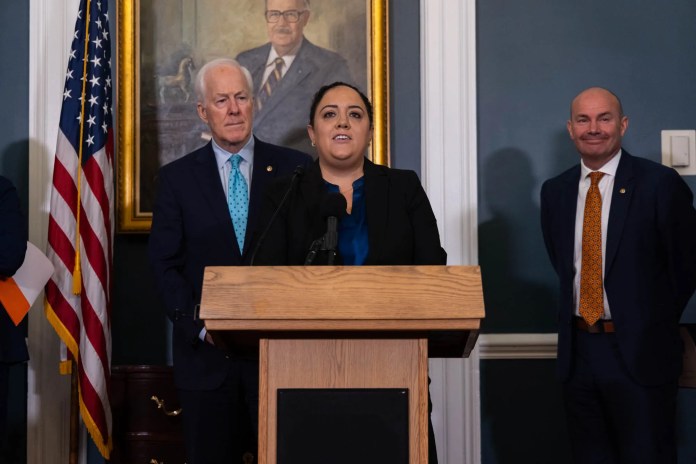 The Washington Examiner's Anna Giaritelli speaks at a press conference.