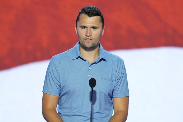Charlie Kirk, co-founder of Turning Point USA, speaks during microphone check before the start of the first day of the Republican National Convention Monday, July 15, 2024, in Milwaukee.
