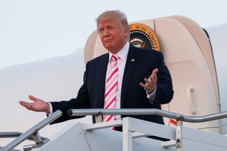 President Donald Trump steps off Air Force One after arriving at Huntsville International airport, Sept. 22, 2017, in Huntsville, Ala. President Donald Trump's administration says U.S. Space Command will be based in Alabama, reversing a Biden-era decision to keep it in Colorado. The announcement was made Wednesday.