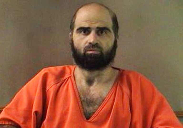 Nidal Hasan, the 2009 Fort Hood shooter, in an orange jumpsuit