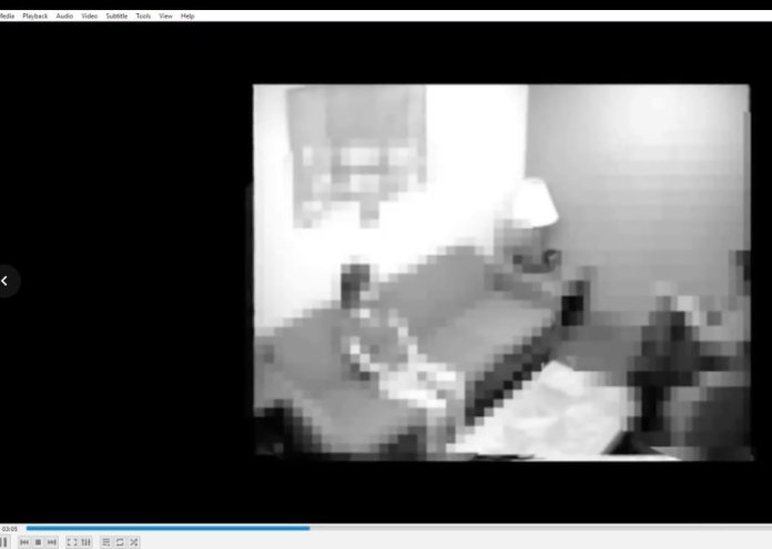 A still image of a victim of Jeffrey Epstein speaking to an investigator about a massage she gave in her "panties" when she was 20 years old.