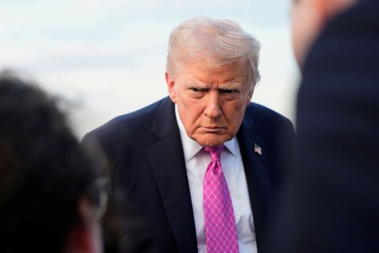 President Donald Trump speaks with reporters before boarding Air Force One at Morristown Airport, Sunday, Sept. 14, 2025, in Morristown, N.J. (AP Photo/Alex Brandon)