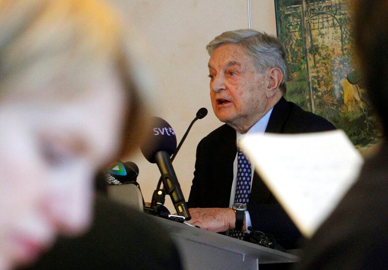 Georges Soros of the Soros Fondation, speaks to the media at the World Economic Forum in Davos, Switzerland, Wednesday, Jan. 25, 2012. The overarching theme of the meeting, which will take place from Jan. 25 to 29, is 