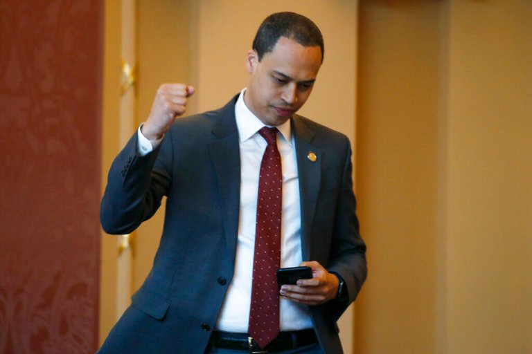 Jay Jones walks and pumps his fist during his time in the Virginia House of Delegates in 2020.