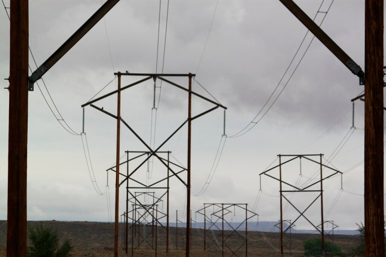 Transmission lines leading from the San Juan Generating Station.